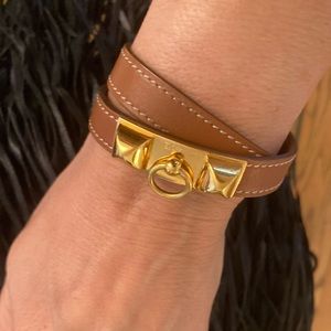 Hermés Double Tour Bracelet in Gold
x Brown Rivale Stud Bracelet